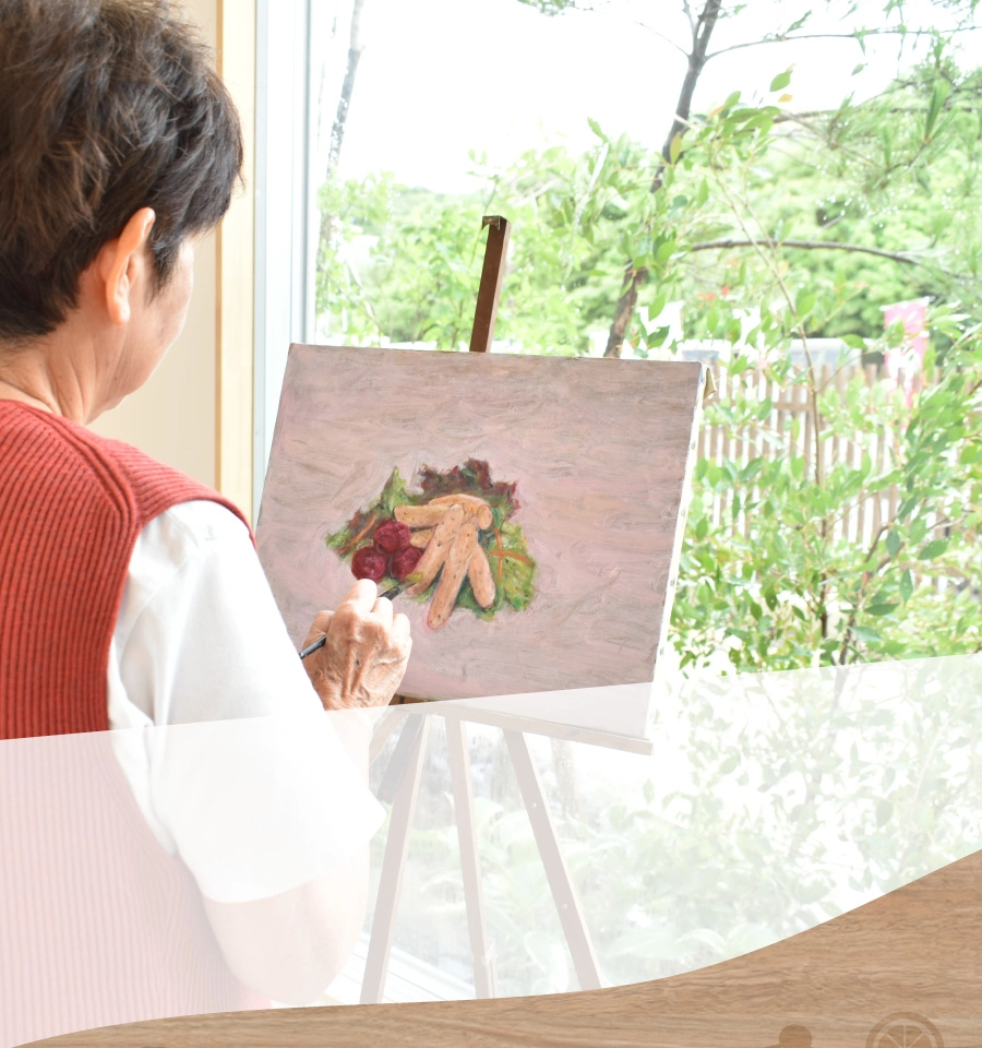 イラストを描いている女の人の背景画像